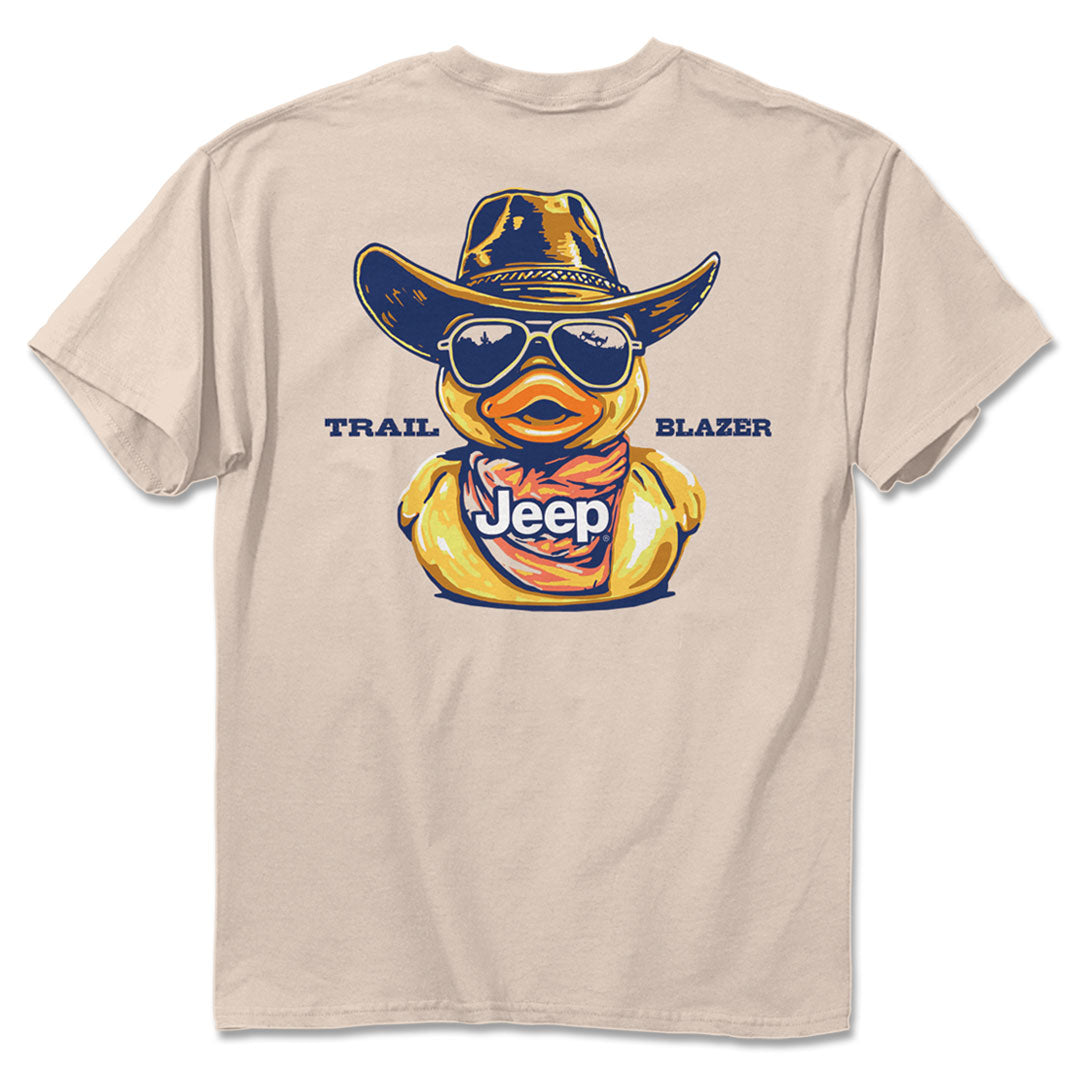 a pale pink t-shirt with a rubber duck wearing a cowboy hat and sunglasses and a jeep bandana with the words “trail blazer”