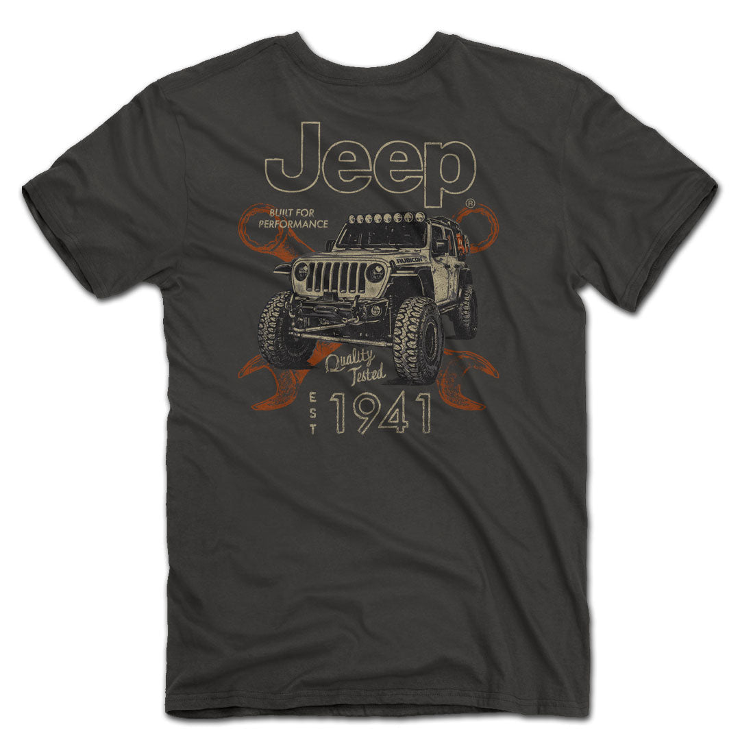 a deep gray shirt with the jeep logo and an illustration of a jeep over a pair of wrenches