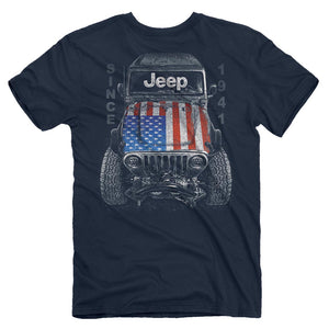 a dark navy t-shirt featuring a jeep seen from above with a usa flag on its hood and “since 1941” around it
