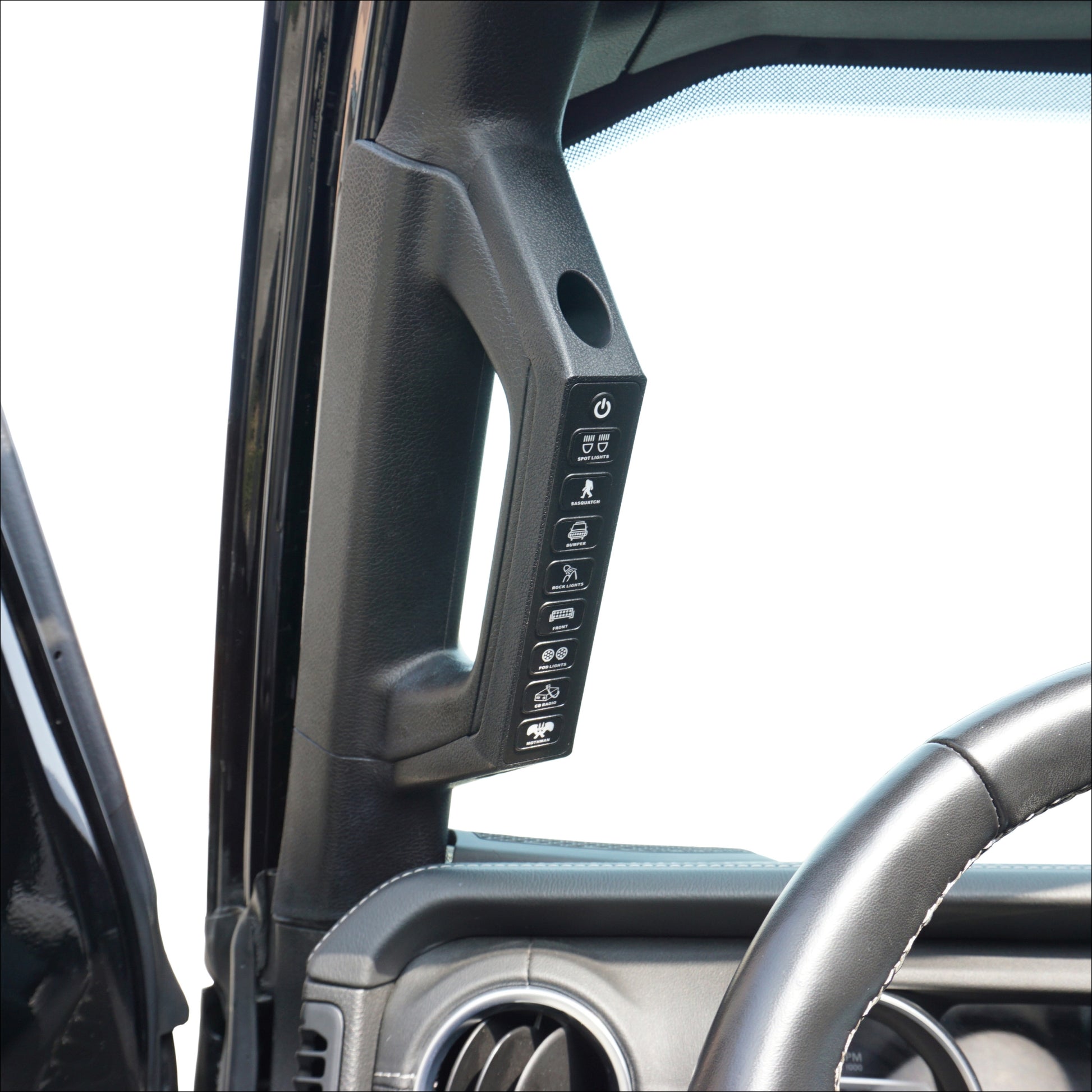 an 8 button panel installed in a vehicle’s grab handle