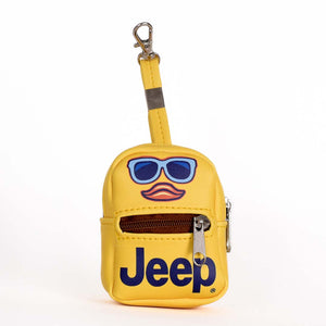 a tiny backpack shaped keychain with the jeep logo and a duck face with sunglasses