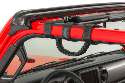 Close-up red jeep vehicle with black grab handle installed