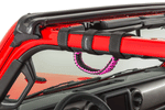 Close-up red jeep vehicle with pink grab handle installed