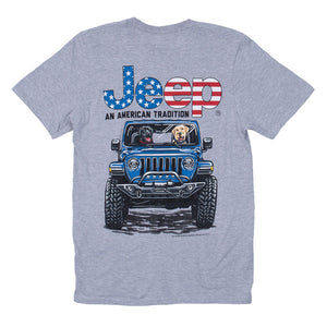 a grey shirt with two dogs driving a blue jeep and the words “jeep an american tradition” with usa flag flair