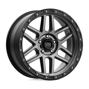 a black wheel with the KMC logo on it
