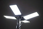a dark space lit up by the telescoping LED light