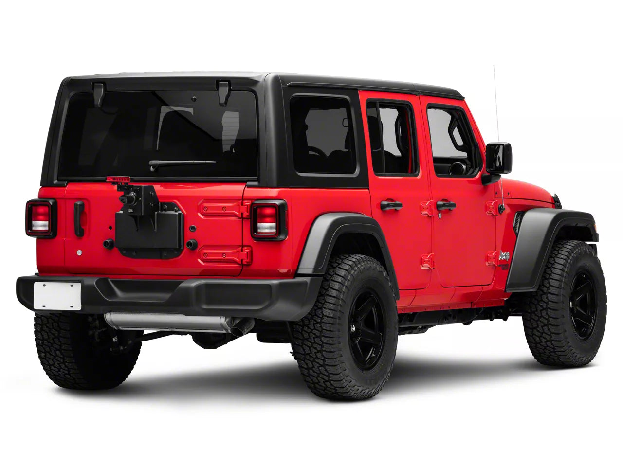 a red jeep wrangler is facing away revealing an installed wheel mount
