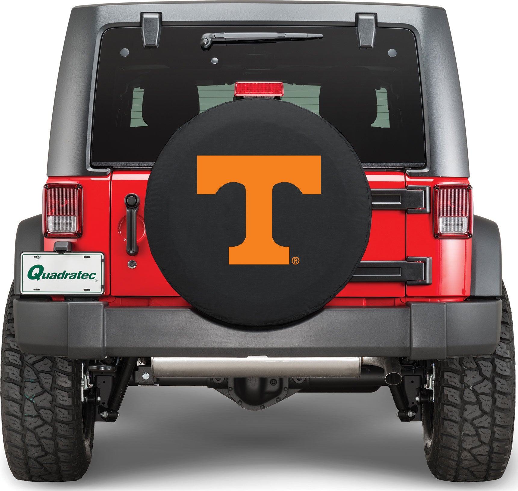 the rear of a red jeep with a tire covered emblazoned with power t