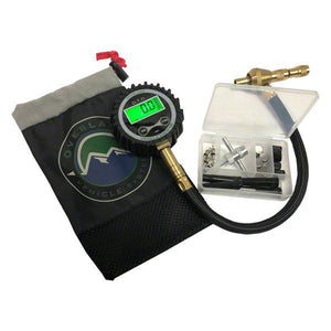 a gauge with various attachments and carrying bag